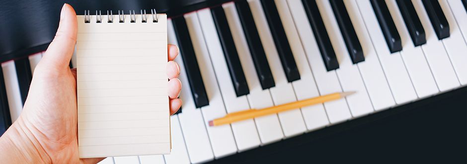 Ecrire de la musique sur un calepin